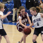 St. Mary Magdalen and Mount Aviat played at halftime of the girls' game on Feb. 3 at the Chase Fieldhouse.