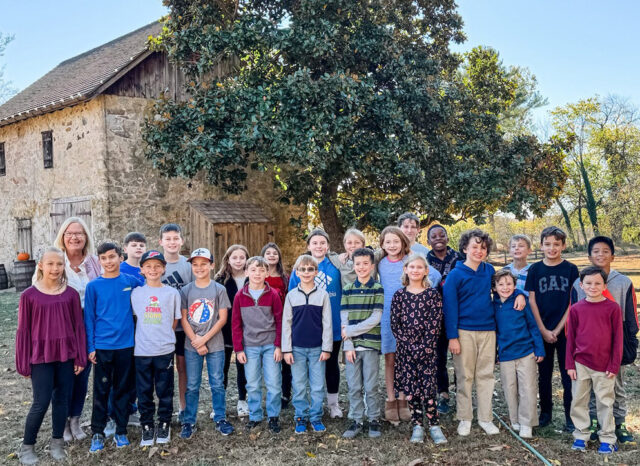 Mrs. Corcoran's 4th & 5th Grade Math Enrichment Classes pose by the barn Historic Odessa Foundation Wilson Warner barn