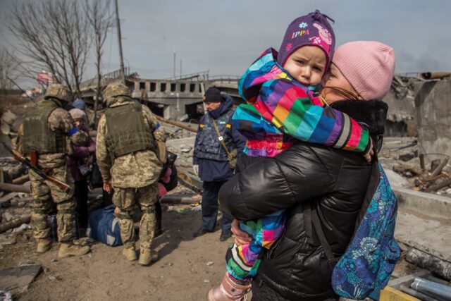 WOMAN CHILD EVACUATION UKRAINE